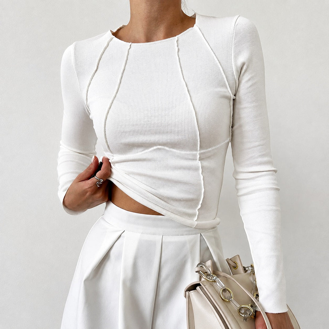 Camisa feminina estilosa com debrum, manga comprida. Conforto e elegância para outono/inverno.
