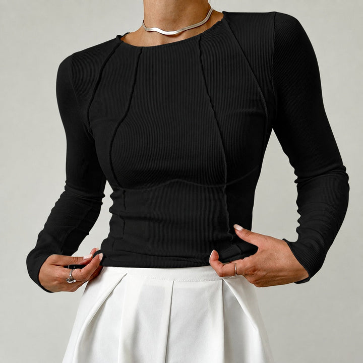 Camisa de manga comprida feminina com debrum. Estilosa e confortável, essencial para outono inverno.