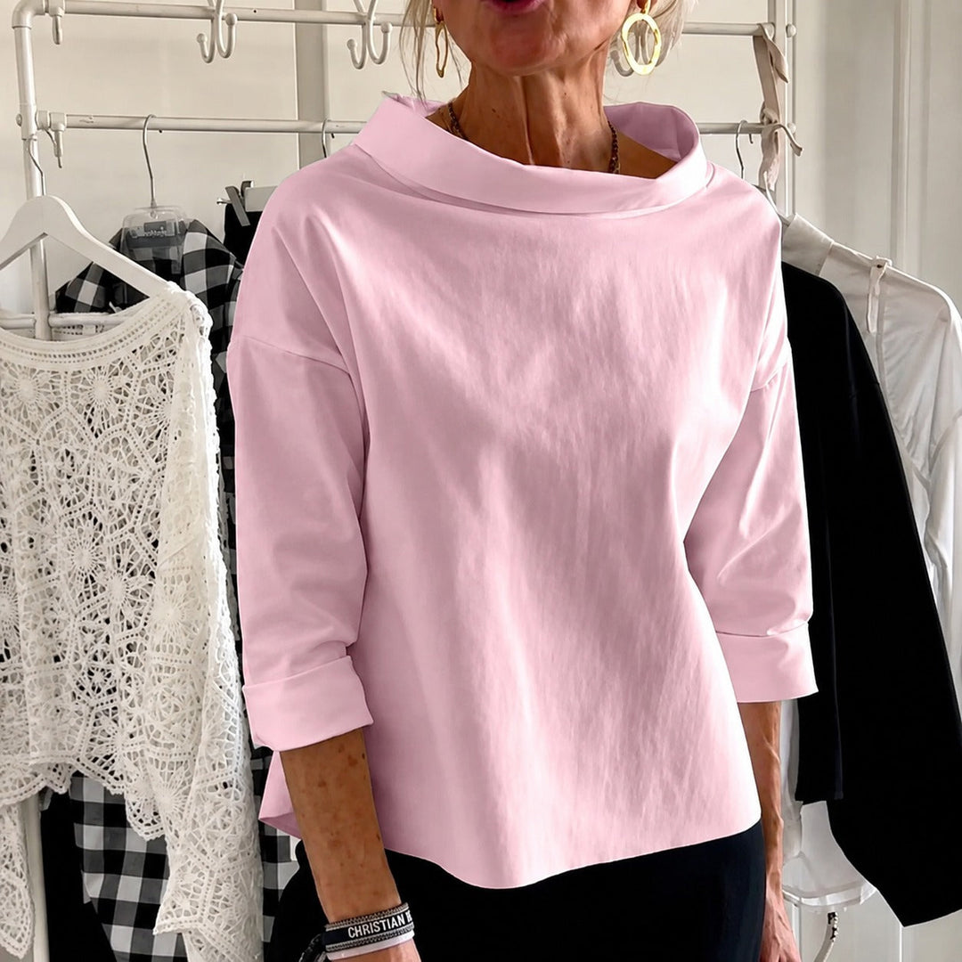 Blusa feminina confortável de gola alta, tecido macio e caimento perfeito. Ideal para uso diário, estilo casual.