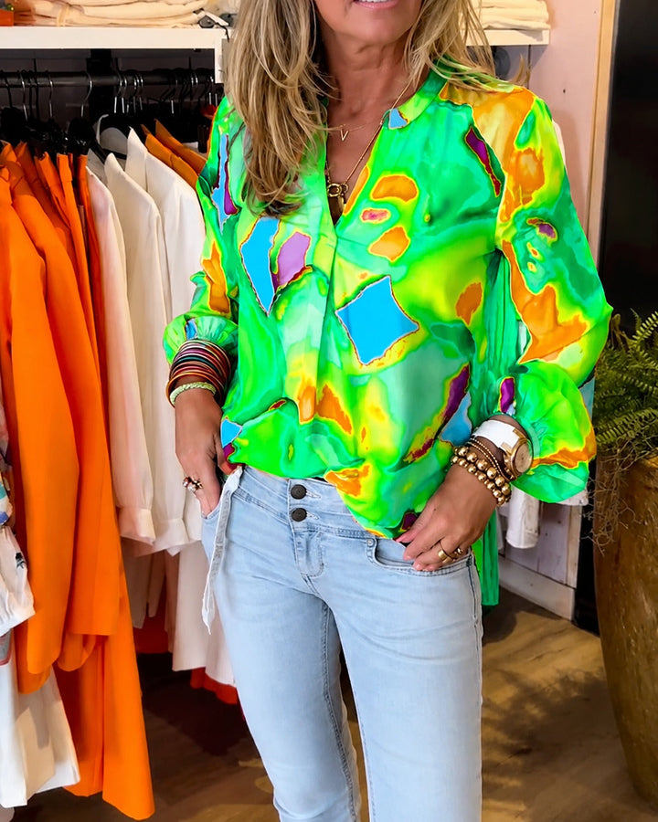 Blusa feminina colorida de manga longa, casual e confortável para o dia a dia, ideal primavera verão.