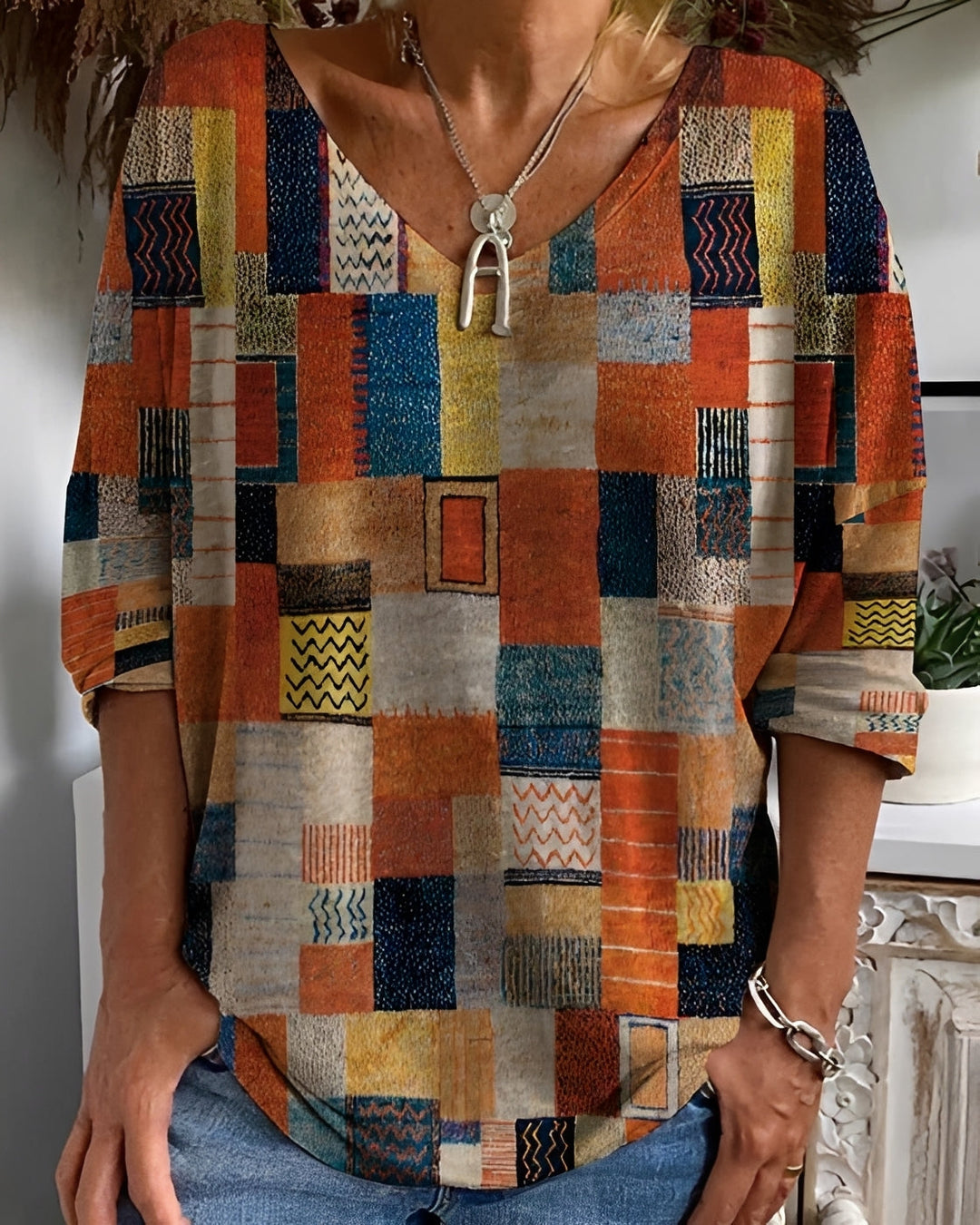 Top feminino estampado étnico para verão, blusa casual com cores vibrantes e design confortável, moda feminina.