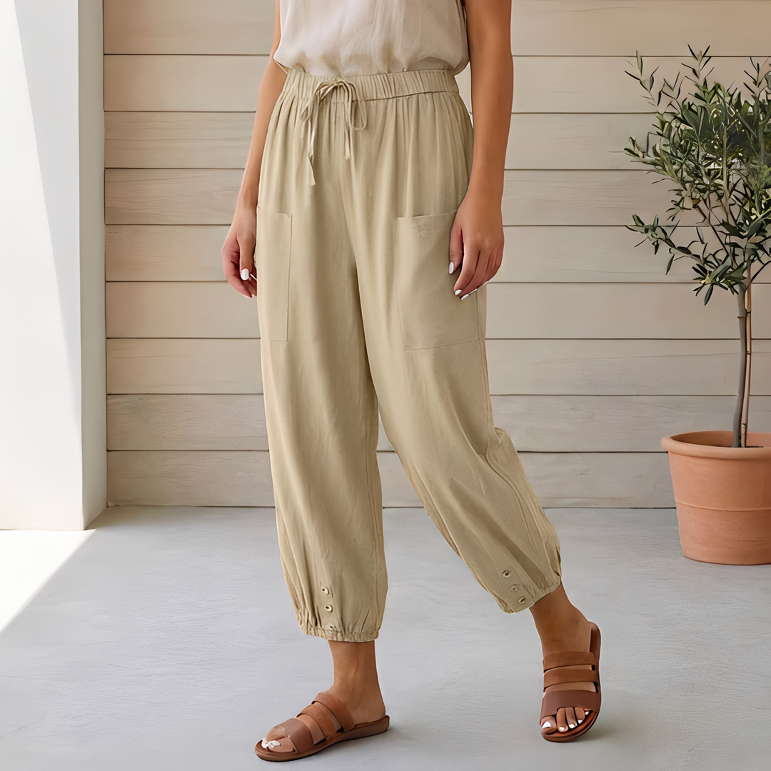 Calça feminina descontraída cintura alta. Ampla e elegante, ideal para o verão. Conforto e estilo para moda diária.