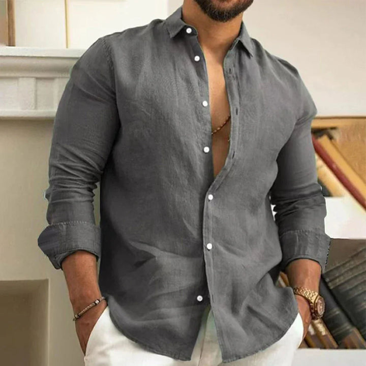 Elegante camisa masculina de linho slim fit, manga longa e gola clássica, perfeita para eventos sociais ou casuais.