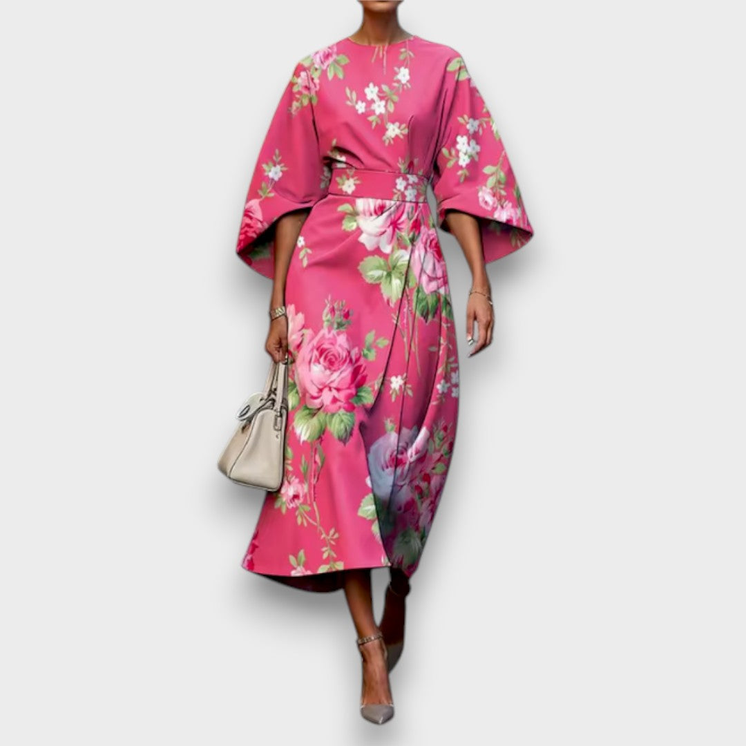 Vestido floral estampado de verão para mulher, design elegante e fluido, ideal para festas e uso casual.