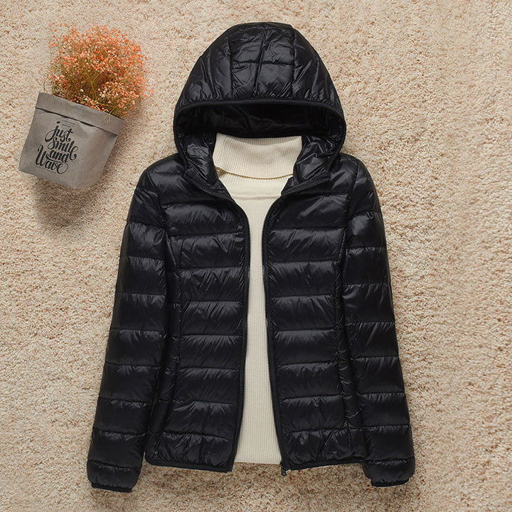 Casaco feminino de inverno Liera, confortável e versátil, estilo moderno com capuz.