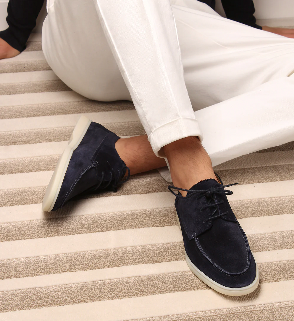 Mocassim masculino elegante em couro, conforto superior para o dia a dia. Ideal para primavera/verão.