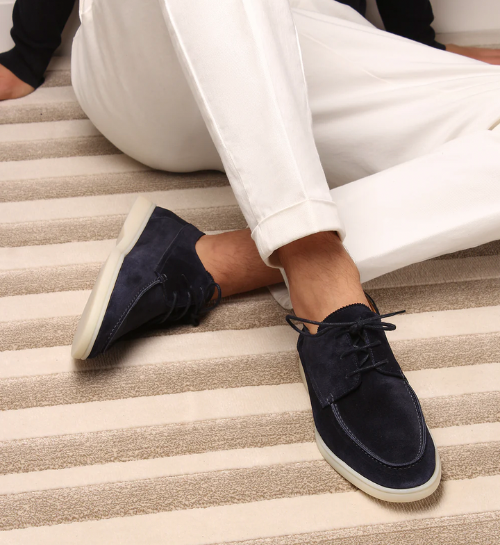 Mocassim masculino elegante em couro, conforto superior para o dia a dia. Ideal para primavera/verão.