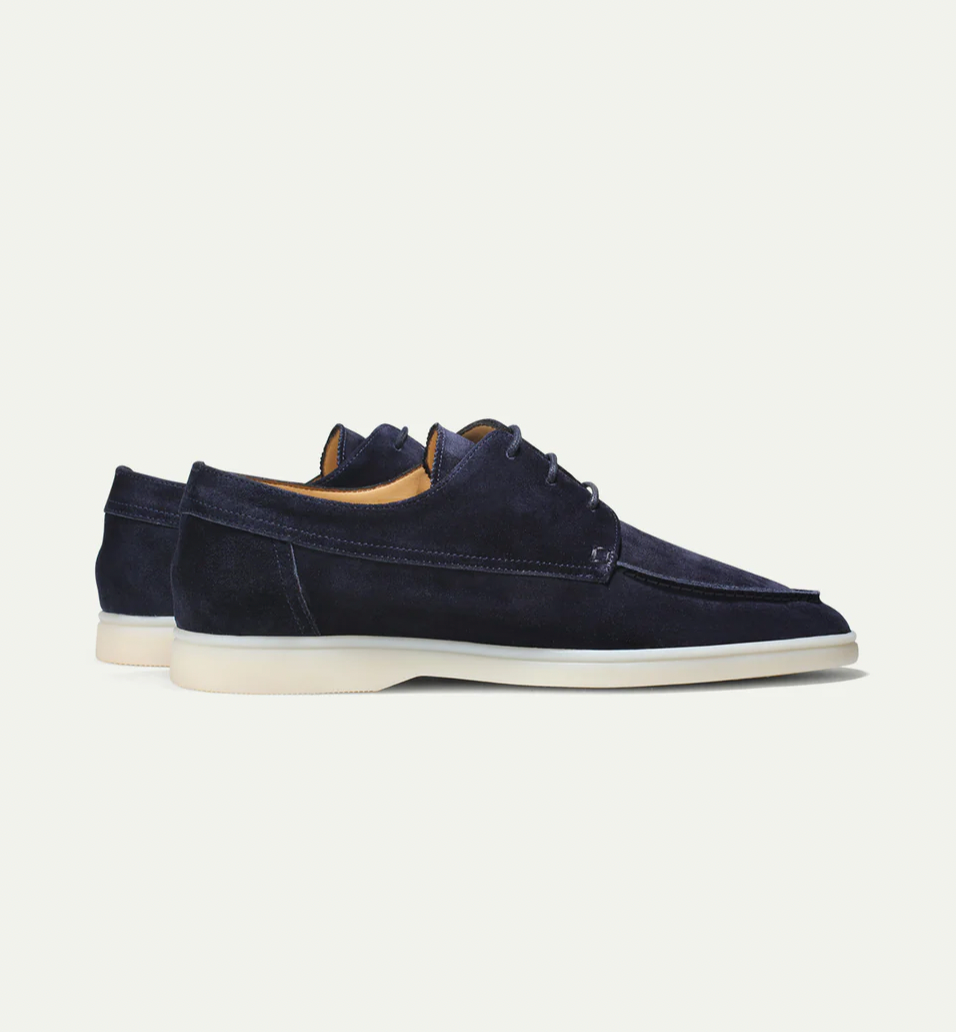 Mocassim masculino bege claro, design casual e confortável. Excelente para verão e uso diário.