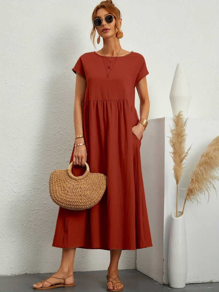 Vestido feminino casual elegante, com toque leve e versátil para os dias quentes de verão.