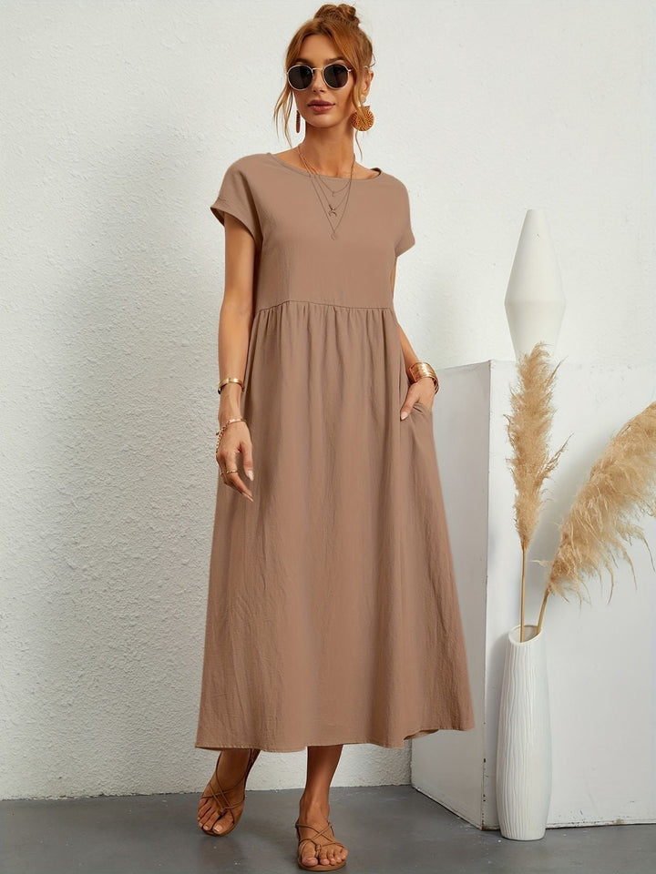 Vestido elegante e leve para mulher, perfeito para um estilo versátil e confortável no verão.