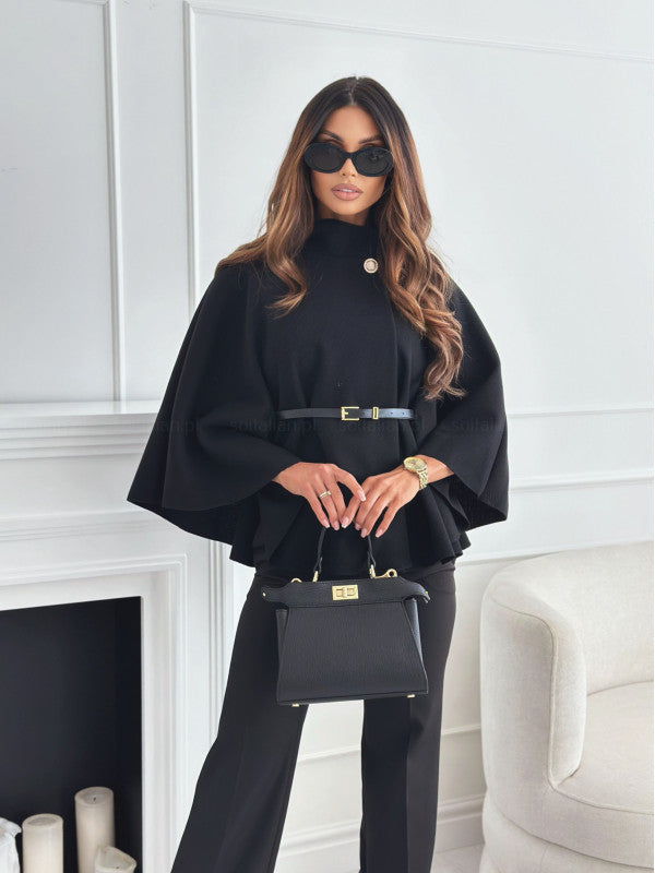 Casaco feminino preto elegante com cintura fina. Roupa chique e versátil para moda outono/inverno.