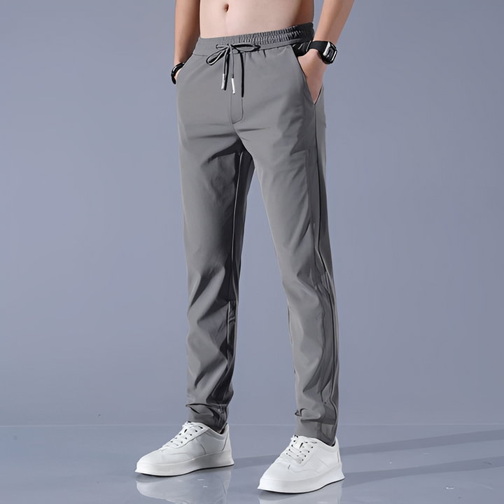 Calça de homem para viagem, com tecido de secado rápido, design confortável e cores modernas, perfeita para aventuras.