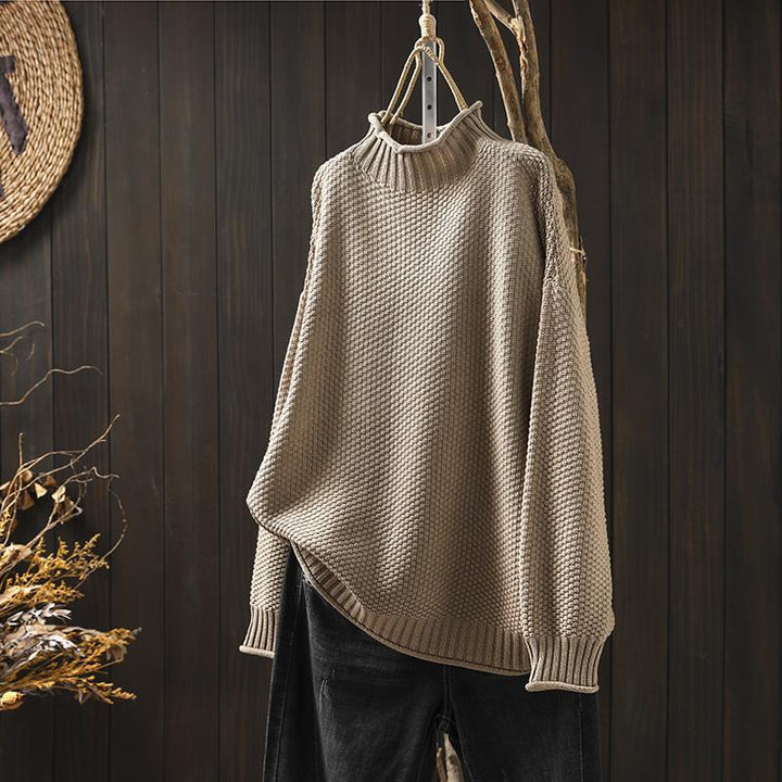 Suéter feminino Noa elegante e versátil, ideal para outono/inverno. Moda confortável e moderna.