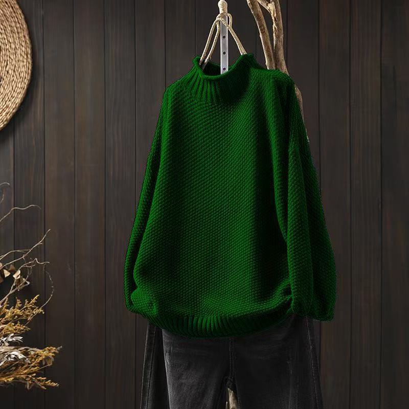 Suéter feminino de inverno em malha macia, a peça ideal para manter-se aquecida com estilo.