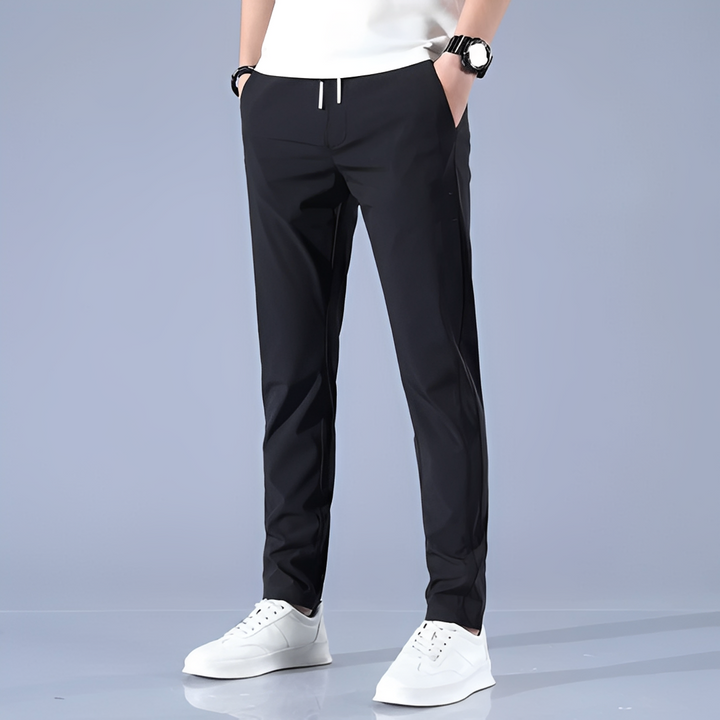 Calça esportiva masculina de secado rápido, garantindo conforto e versatilidade para o dia a dia e atividades.