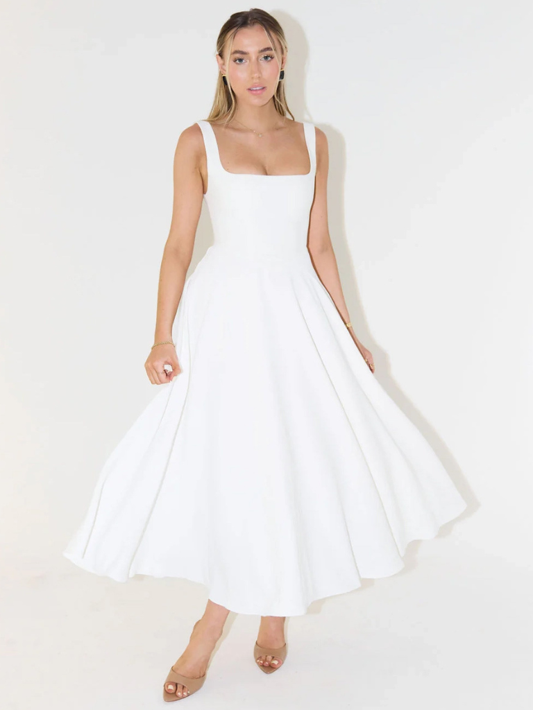 Vestido de moda feminina ombro a ombro, elegante e versátil.