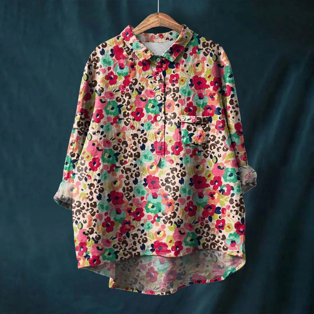 Camisa feminina floral confortável, tecido leve, ideal para looks casuais ou eventos de verão. Frescor e estilo versátil.