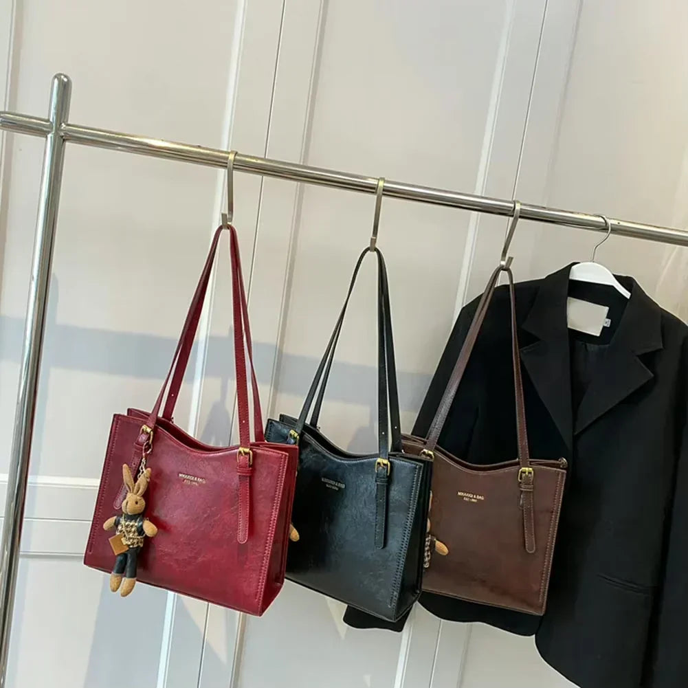 Bolsa Feminina Vintage Lena vermelha, um acessório de ombro elegante que combina com tudo.