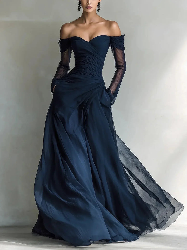 Vestido longo feminino azul com ombros descobertos, elegante e confortável para festas ou casamentos.