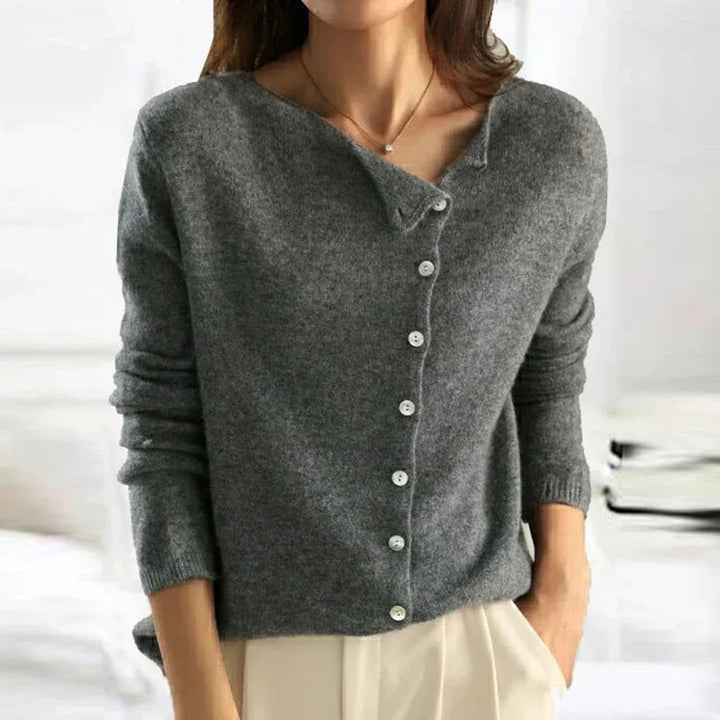 Suéter feminino de malha elegante, ideal para o outono/inverno. Agasalho versátil e confortável.