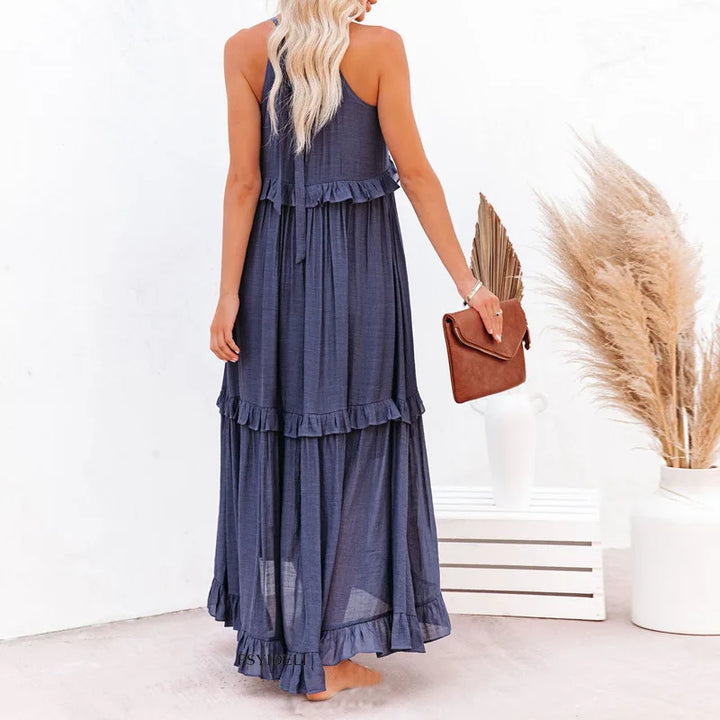 Vestido elegante feminino longo, babados e alças finas. Ótimo para festas ou eventos de verão.