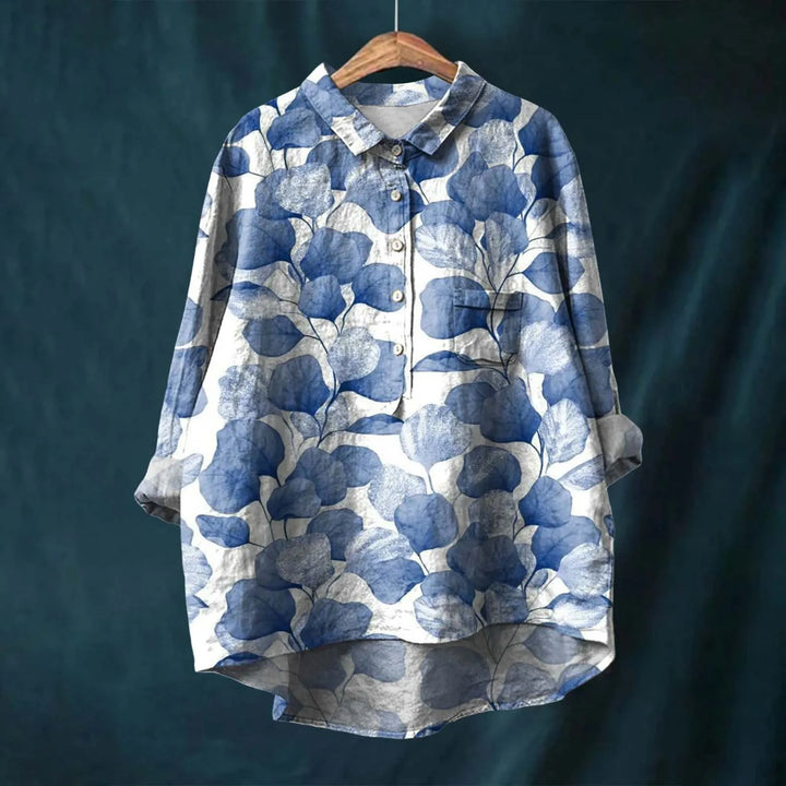 Desfrute do verão com esta blusa floral feminina estilo boho chic, manga longa e caimento solto. (PT)