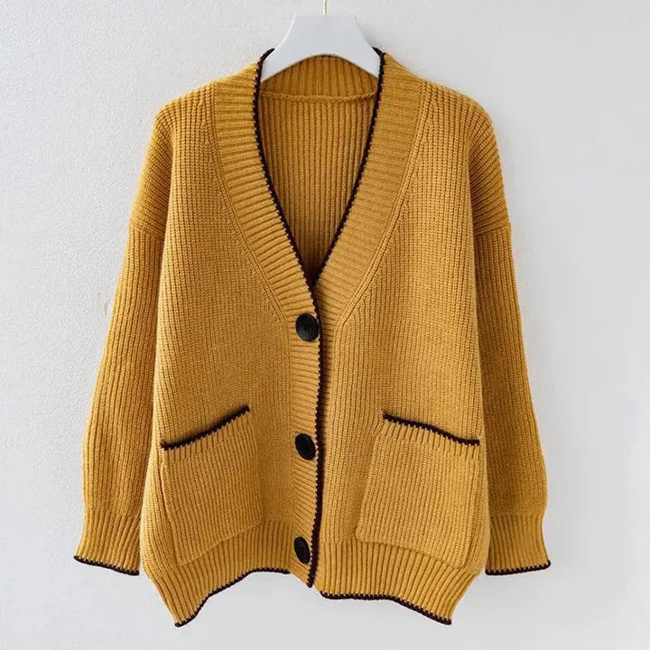 Cardigan feminino Neriza oversized, estilo casual e elegante. Perfeito para moda outono-inverno.