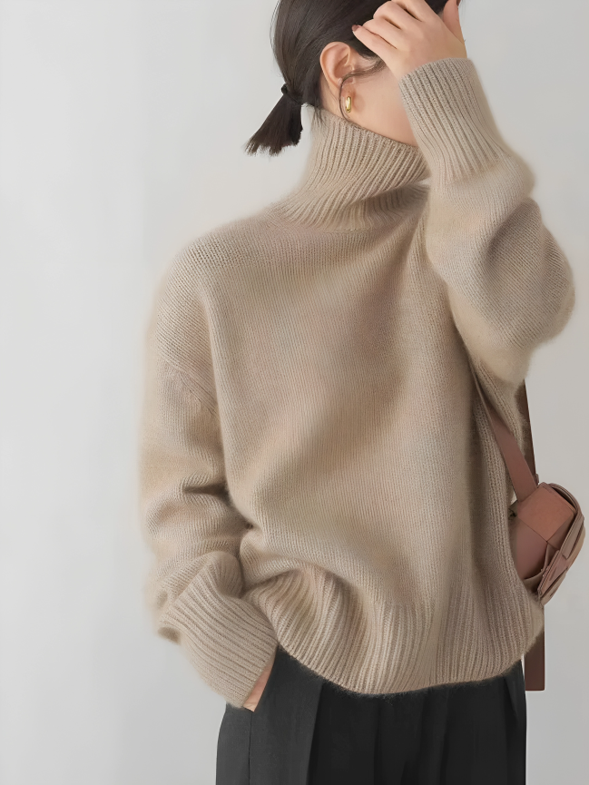 Vestuário feminino de inverno: suéter elegante de gola alta para conforto e estilo casual.