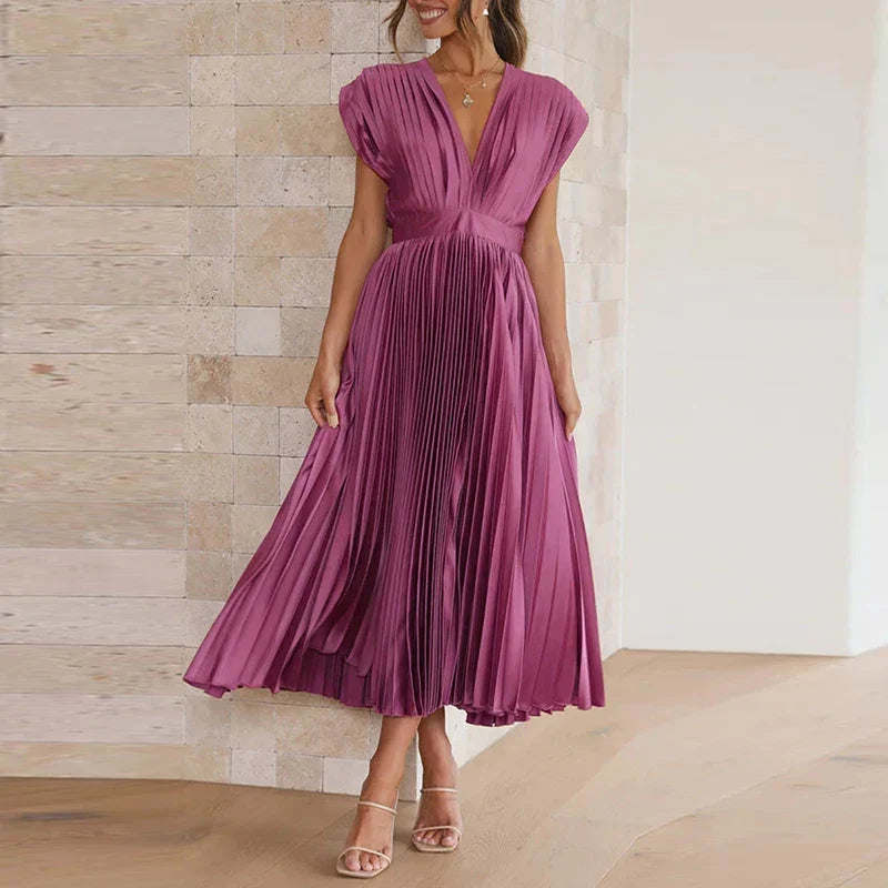 Vestido midi elegante para mulher, sem mangas, ideal para verão e ocasiões especiais.
