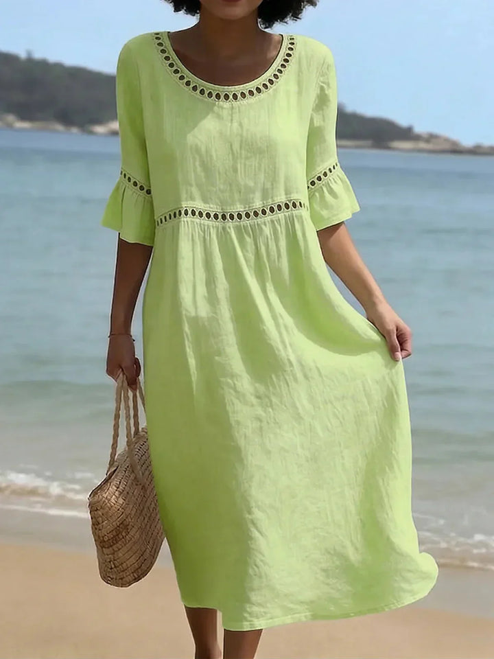 Vestido feminino elegante longo, com design que valoriza a silhueta e efeito ventreplano. Para todas ocasiões.