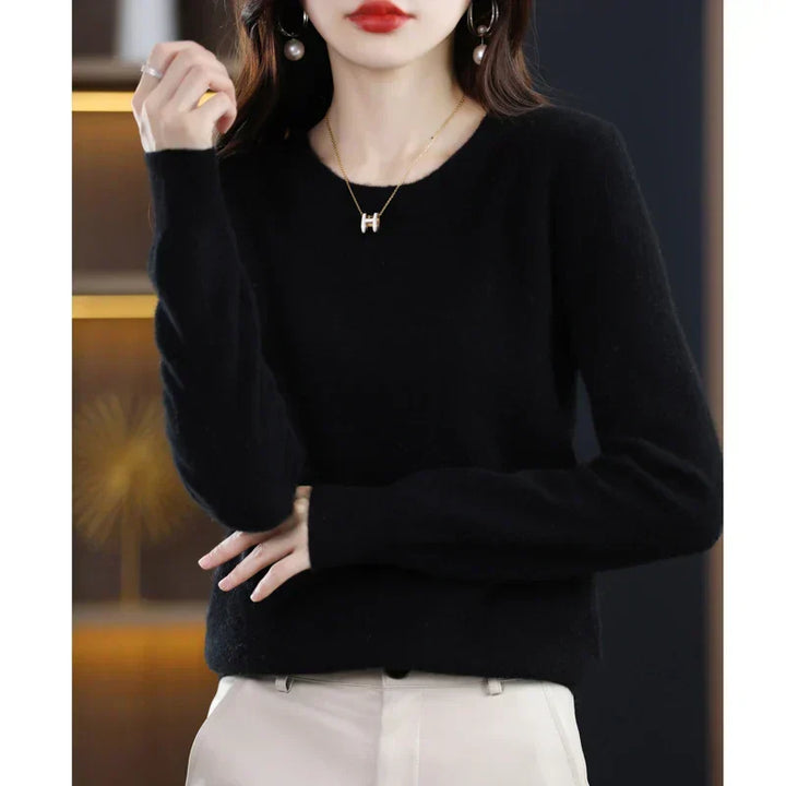 Suéter de malha para mulher, decote redondo, ideal para combinar com diversos estilos de roupa.