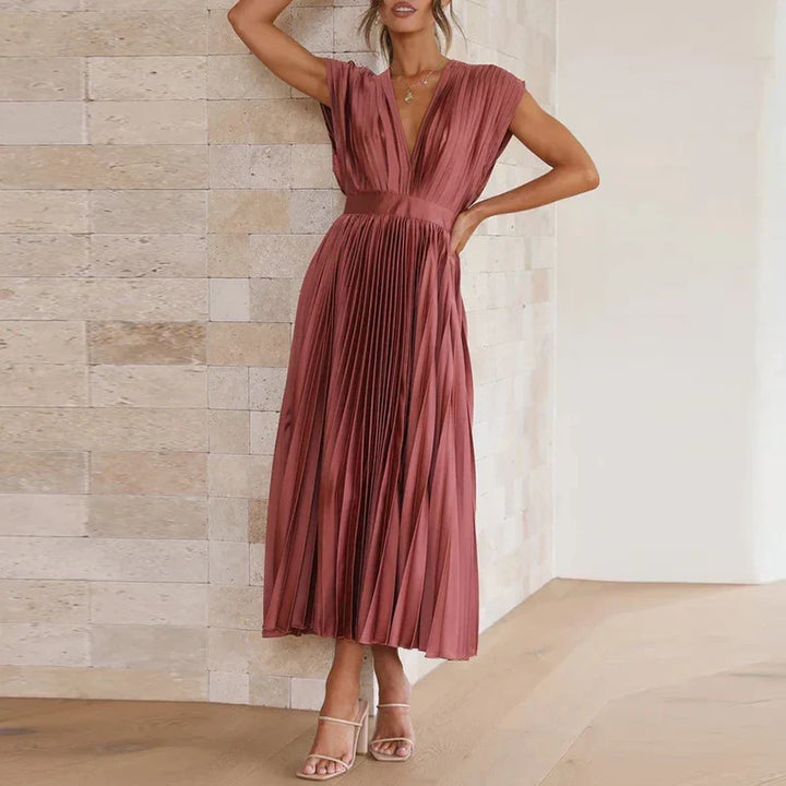 Vestido midi sem mangas e elegante, para mulher, ideal para um look versátil e sofisticado.