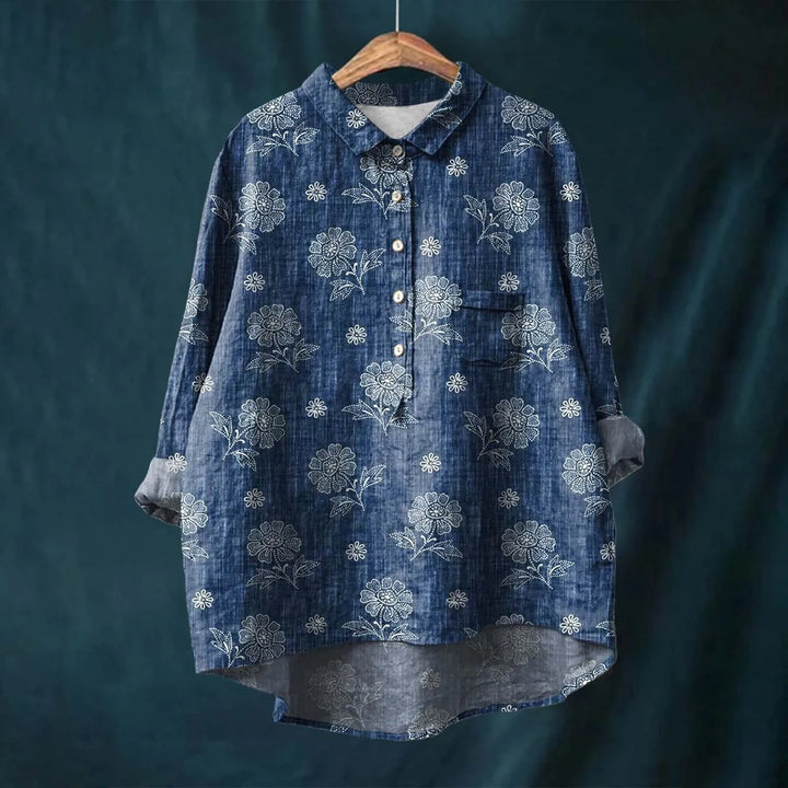 Blusa feminina floral solta com estampa vibrante. Ideal para um look casual chic e confortável no dia a dia.