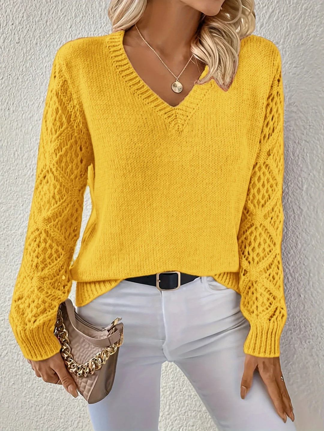 Suéter feminino moderno e casual com decote em V, em malha para máximo conforto no outono/inverno.