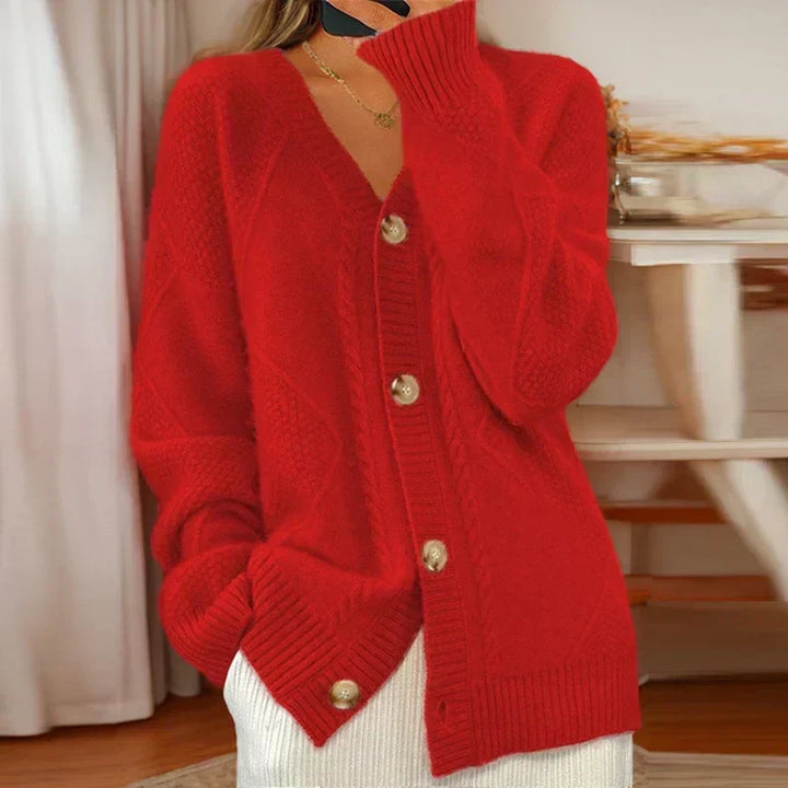 Cardigan rosa feminino, aconchegante e elegante. Peça de roupa versátil para um outono/inverno confortável.