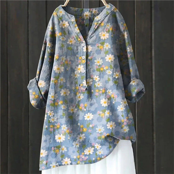Camisa feminina floral confortável, disponível em tamanhos grandes. Estilo elegante para primavera.