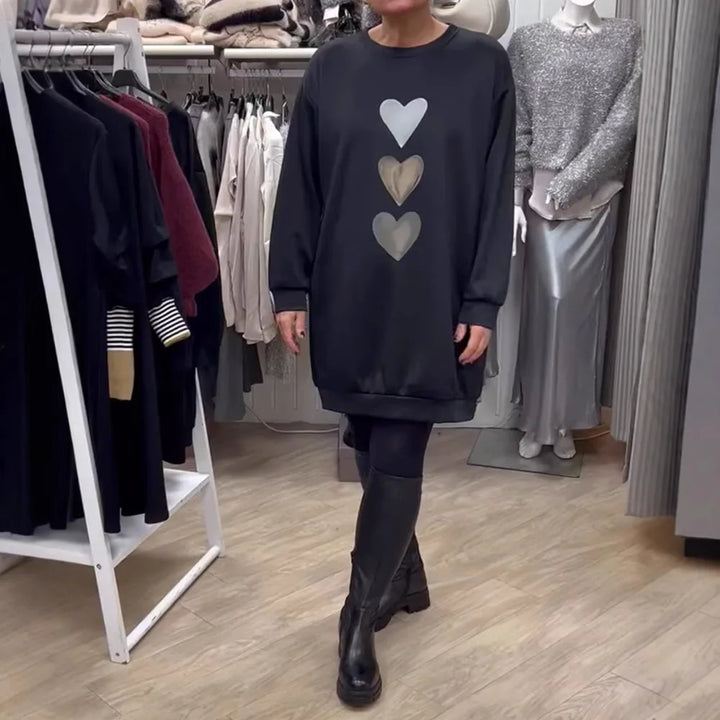 Camisola feminina preta Lovinda, estilo casual e confortável para o dia a dia, com bolsos. Perfeita para outono/inverno.