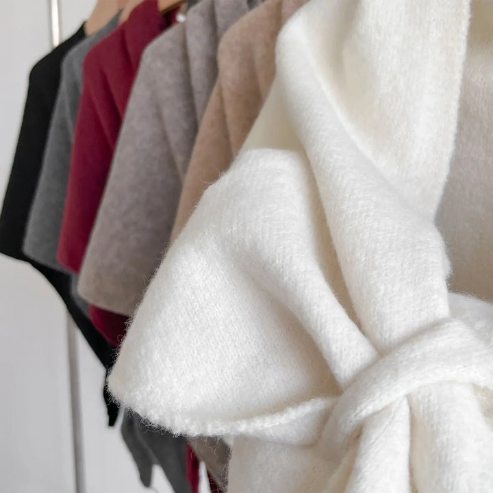 Cachecol de inverno elegante e macio para mulher, ideal para um presente sofisticado.