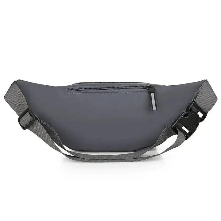Detalhe: bolsa de cintura masculina antifurto de canvas, textura resistente e perfil ultrafino.