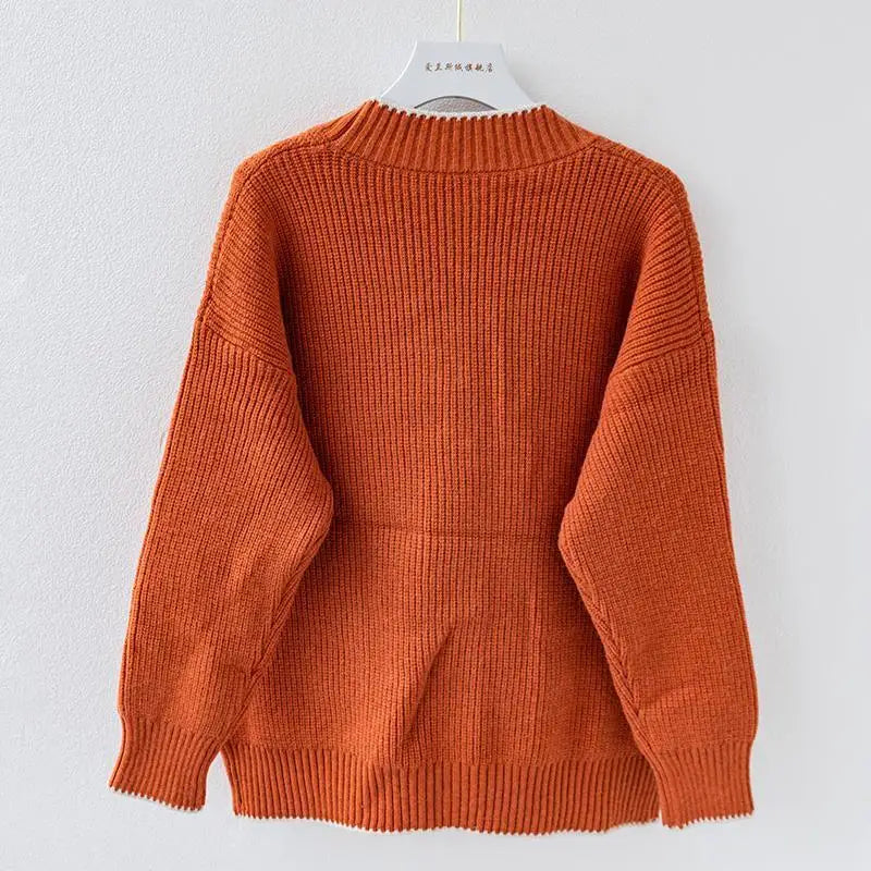 Blusa de frio feminina Cardigan Neriza. Tendência da moda outono-inverno, para um visual aconchegante e chic.