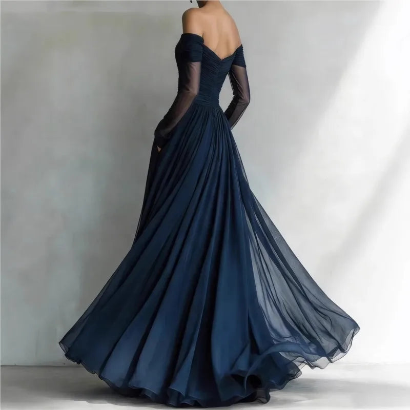 Moda feminina: Vestido longo elegante azul, ombros descobertos. Perfeito para eventos, garante conforto e estilo.