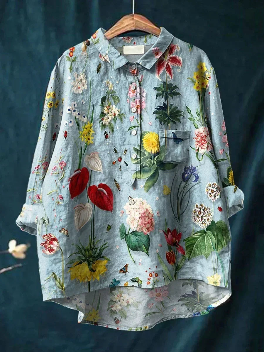 Roupa feminina: camisa floral de manga longa com estampa vibrante. Estilo solto e confortável para moda verão.