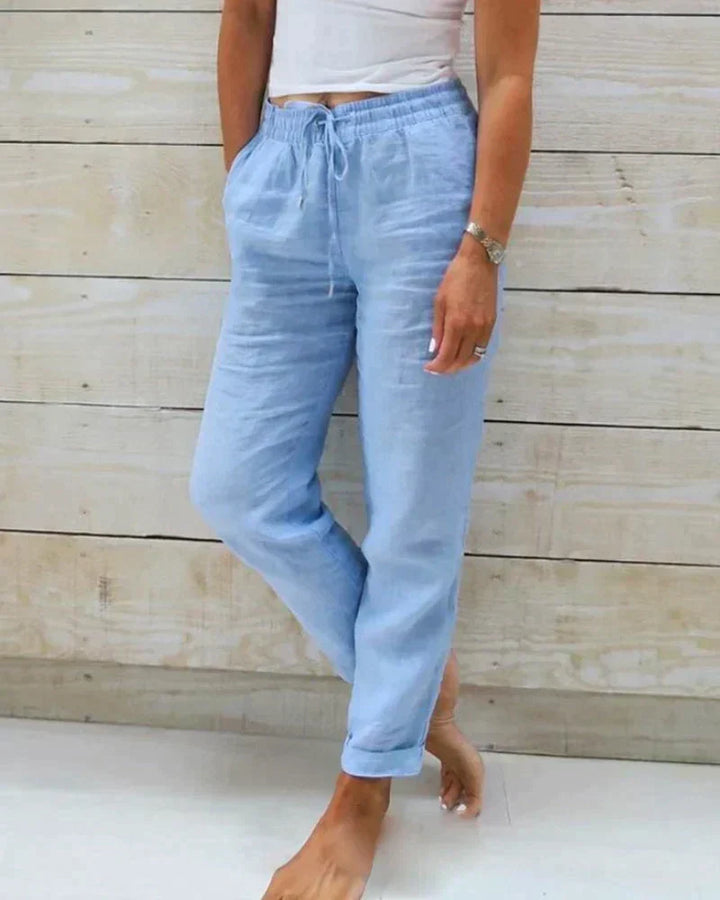Calça feminina Stacy leve e confortável para o verão, ideal para um look casual e fresco. Cintura alta, calça solta.