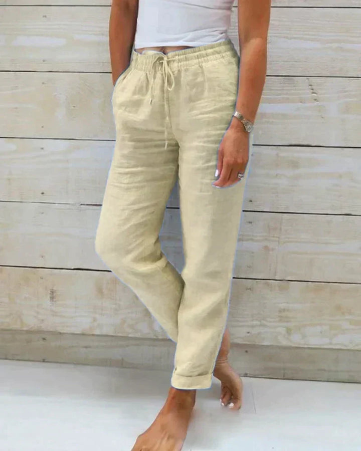 Calça Stacy feminina casual e versátil para moda verão. Estilo solto de cintura alta, tendência confortável e fresca.