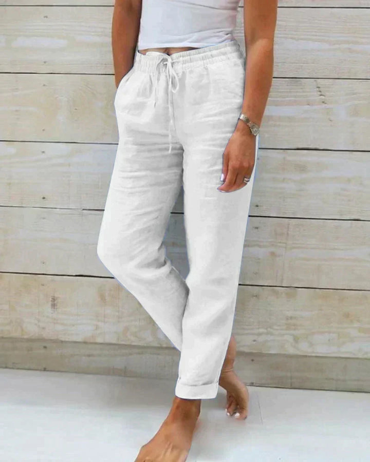 Calça feminina Stacy de cintura alta, corte solto. Leve e confortável, perfeita para o dia a dia e para o verão.