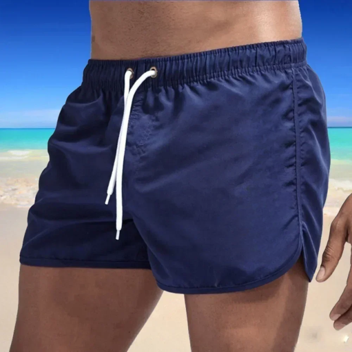 Calção de banho masculino elegante para praia e piscina, com tecido de secagem rápida para máximo conforto.