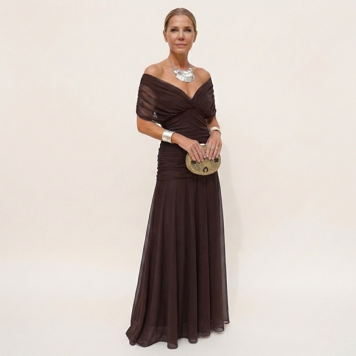 Vestido longo feminino elegante com decote V e cintura marcada, perfeito para festas e ocasiões especiais.