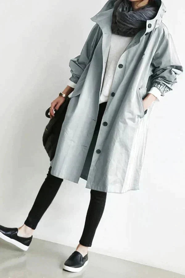 Sobretudo feminino com capuz, proteção chic para outono/inverno. Jaqueta oversized elegante e confortável.