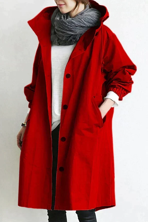 Sobretudo feminino de outono/inverno, oversized e elegante com capuz. Estilo chic e proteção garantida.