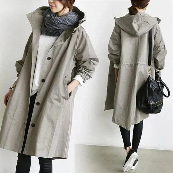 Jaqueta feminina oversized com capuz, proteção chic para inverno. Sobretudo estiloso e confortável.